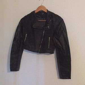 Cropped studded denim and leather jacket